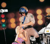 Busty blonde Gina Lynn sucks and fucks a cop 5