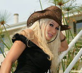 Cowgirl Gina Lynn Strips Down Naked 21