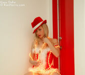 Lustful Kara in a christmas outfit wrapped with lights