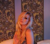 Jess Davies teasing on the bed in her blue see through 5