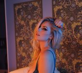 Jess Davies teasing on the bed in her blue see through 16