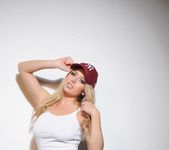Holly teases in her Yankees cap and white top 4