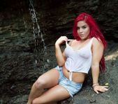 Harley strips naked under a waterfall 4