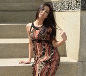 Bella teases in her dress on the steps 6