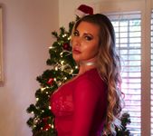 Samantha Saint Christmas pics in front of a Christmas tree 7
