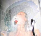 Nicole Aniston takes a hot shower 5