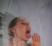 Nicole Aniston takes a hot shower 12