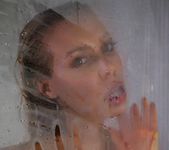 Nicole Aniston takes a hot shower 13