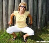 Blonde Hungarian MILF has some dirty fun outdoors