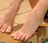 Tasha Reign shows off her feet along with her blue bikini by 8