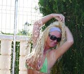 flashing and play in outdoor public shower by pool 17