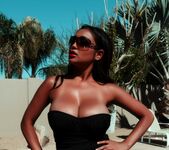 Super hot Priya Rai gets a nice tan by the pool 6