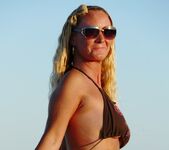 Natalie K - sunset topless on the public beach 13