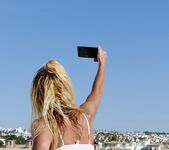 Natalie K - BTS selfie outdoor flashing in ModelCentro top 4
