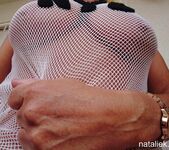 Natalie K - Spreading and fingering naked in string vest 6