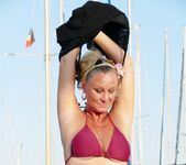 Natalie K - Bikini strip on a boat in the marina 8