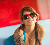 Busty teen babe Hailey Leigh poses with sexy red sunglasses 7