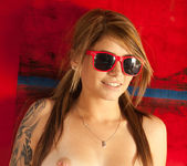 Busty teen babe Hailey Leigh poses with sexy red sunglasses 13