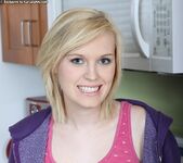 Amanda - blonde teen shows her pussy in the kitchen