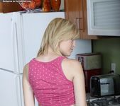 Amanda - blonde teen shows her pussy in the kitchen 5