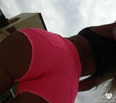 What's under pink shorts of Melena Maria Rya? 12