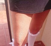 Selfshot in short skirt high heels and knee high socks 5