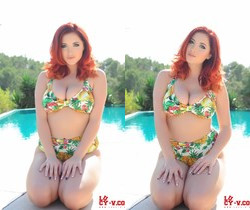 Lucy V teases in her cute floral print bathing suit - Solo Sexy Photo Gallery
