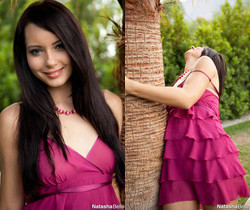 Natasha Belle strips out of her dress next to a palm tree - Solo Porn Gallery