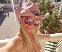 Fingering outside on my balcony in pink bikini top and cowgi - MILF Sexy Gallery