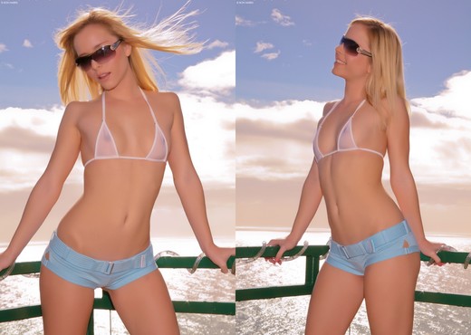 Kara stripteasing on the terrace pulling her bra - Solo Sexy Photo Gallery