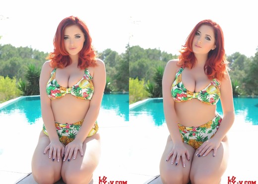 Lucy V teases in her cute floral print bathing suit - Solo Sexy Photo Gallery