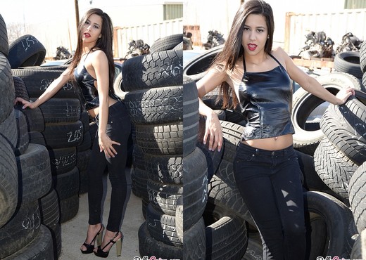 Bella strips in the junkyard - Solo Sexy Photo Gallery