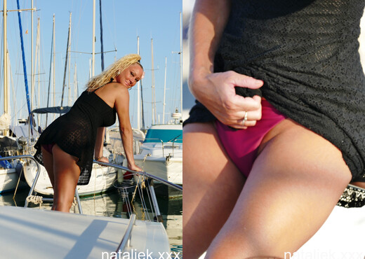 Natalie K - Bikini strip on a boat in the marina - MILF Porn Gallery